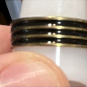 White and Gold Ring with Black Accents